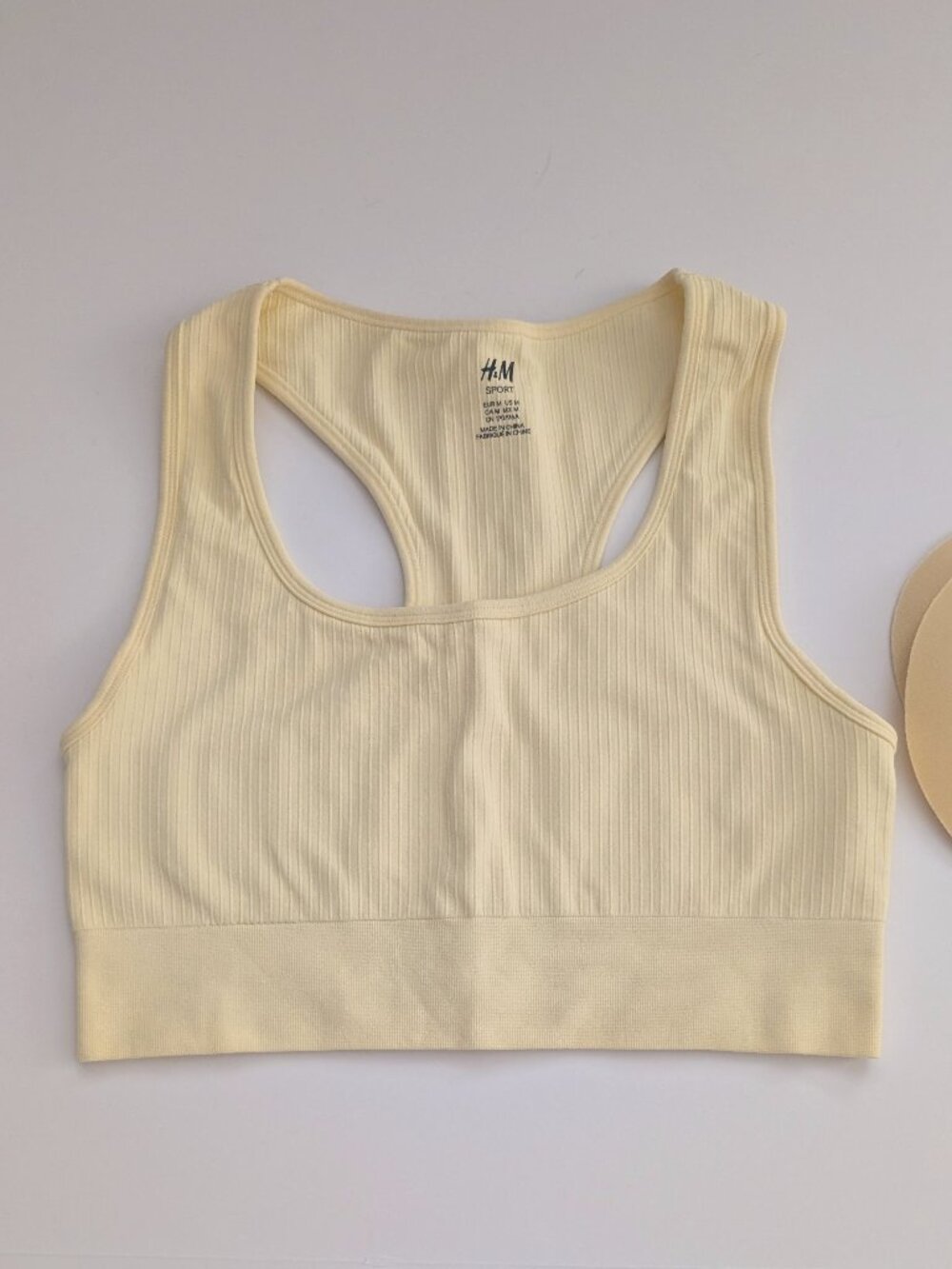 H&M DryMove™ Seamless Ribbed Sports Bra in Yellow